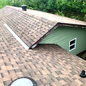 Iko Cambridge architectural shingles, with turbo vents and exposed metal valley