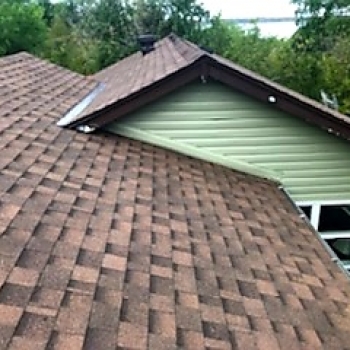 Iko Cambridge architectural shingles, with turbo vents and exposed metal valley